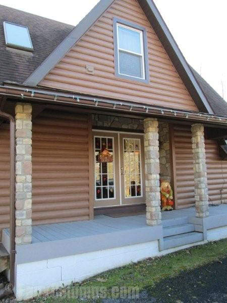 Porch column ideas can be given an exciting look with faux cobblestone.