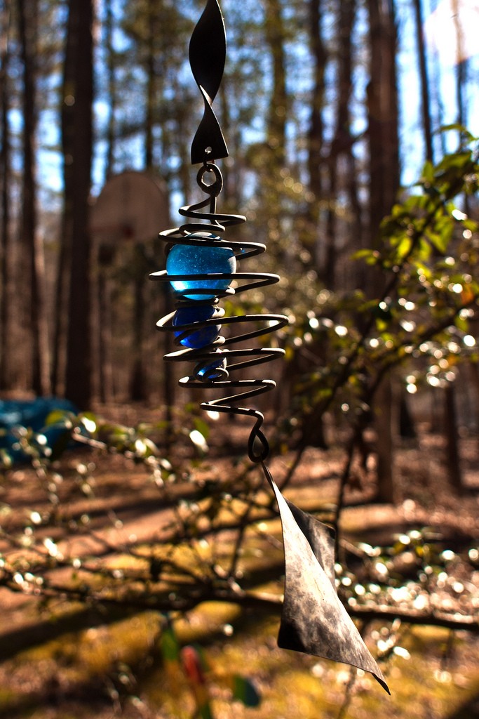 Wind chimes are a great way to add a personal touch to your garden design.