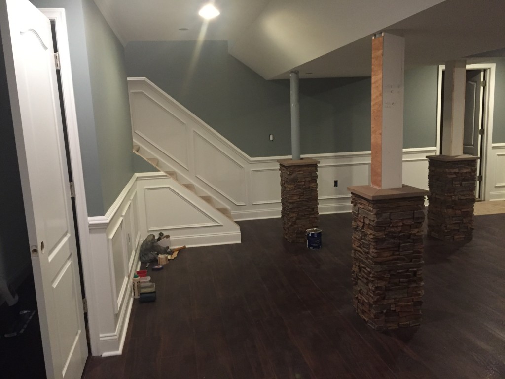 Basement pillars with Norwich stacked stone pillar wraps