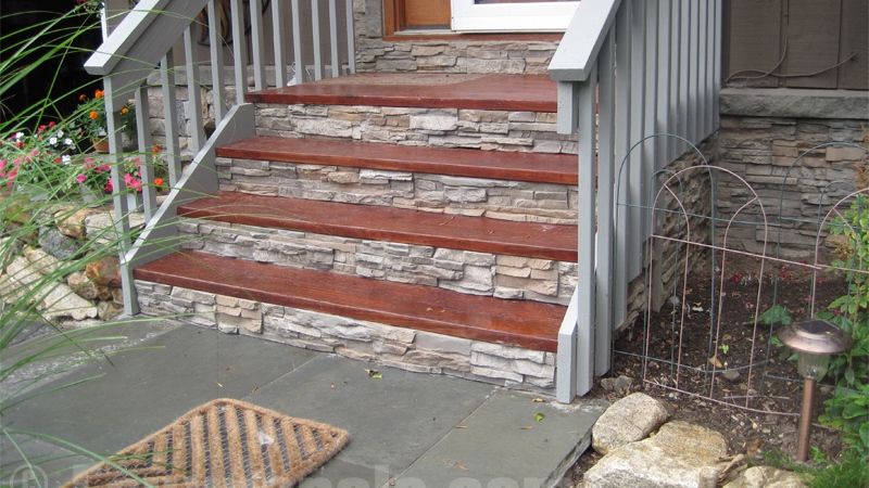 Faux stone panels on steps