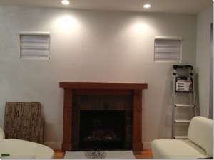 Covering up the niche above the fireplace before adding the fireplace surround.