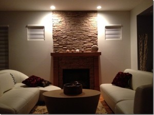 This DIY project updated the look of this fireplace with the help of synthetic stone panels.