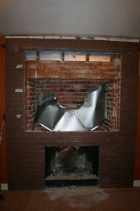  Knocking through the brick wall gave Shana plenty of room to build an in-wall media center.