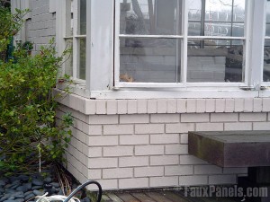 Brick veneer siding helps restore the exterior of a 1920s house