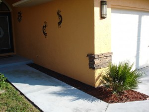 Incredible use of decorative stone along with the already beautiful home greatly enhanced the design.