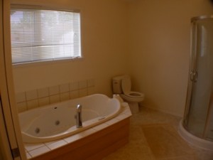 Bathroom remodeling doesn't need to be hard or expensive. What can be done to update this boring bathroom?