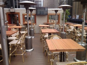 The rooftop dining area of Local NYC was giving a faux brick makeover worthy of the NYC skyline.