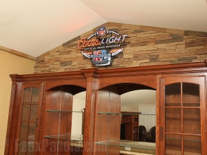 Top of home bar with panels cut to fit with a wood saw