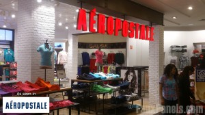 White brick panels enhance the visual appeal of clothing displays.