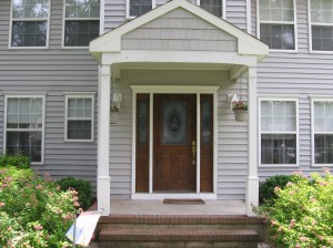 Neal's old, original front entranceway was boring and dated before he added panels.