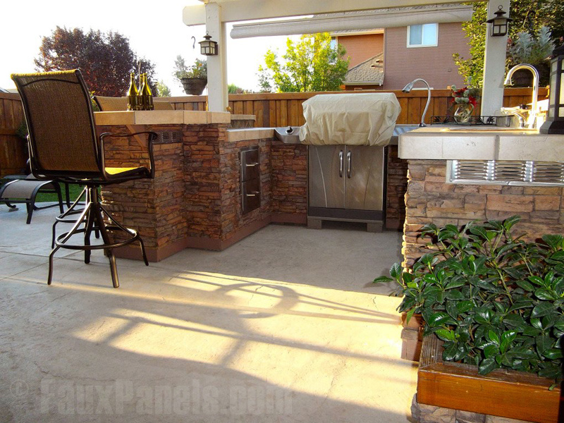 Man made stone panels provide a comfortable ambiance to outdoor living spaces.