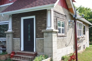 Home exterior upgraded with faux stone wainscoting