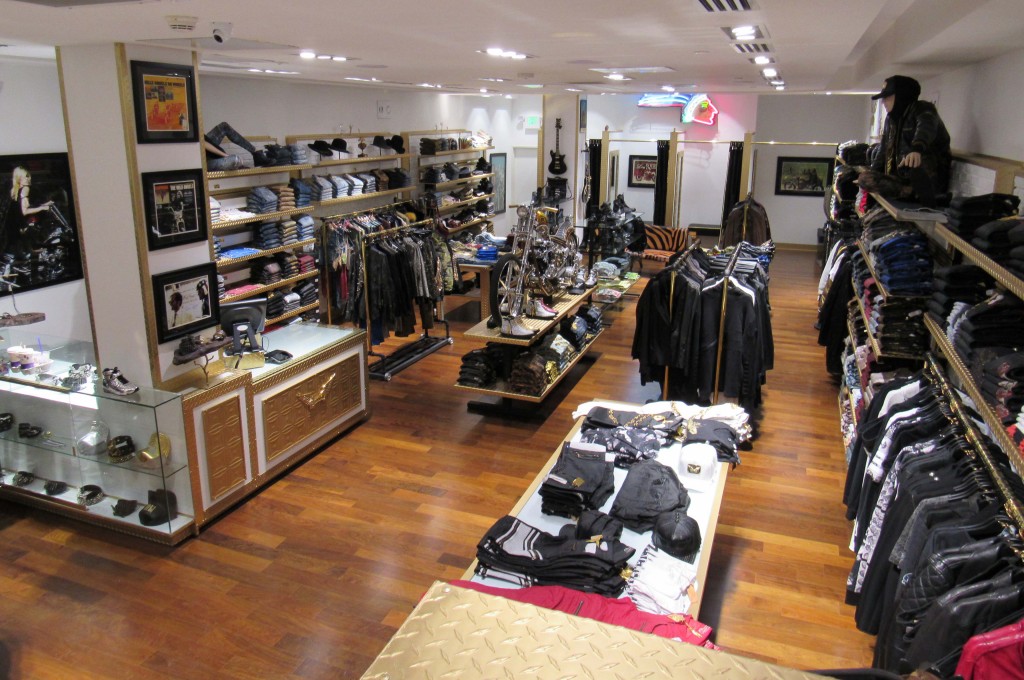 Interior of Robin's Jean clothing store, with crisp, white brick style panels to set off the merchandise.