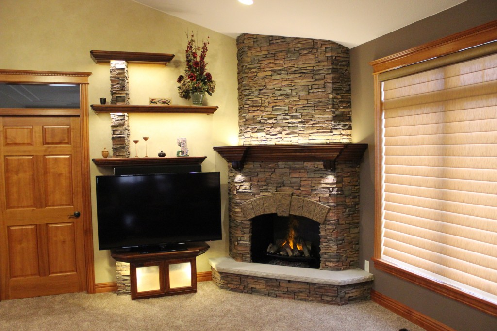 Stunning stacked stone fireplace built with polyurethane panels