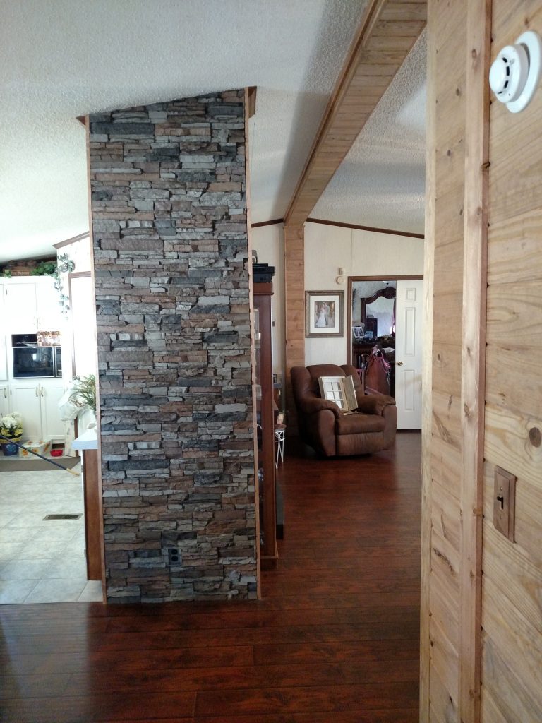 Stacked stone panels cut and fitted to cover a home's support column.