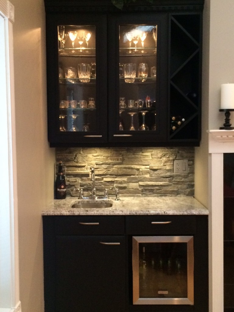 Wetbar backsplash created with seamless, waterproof FauxPanels.