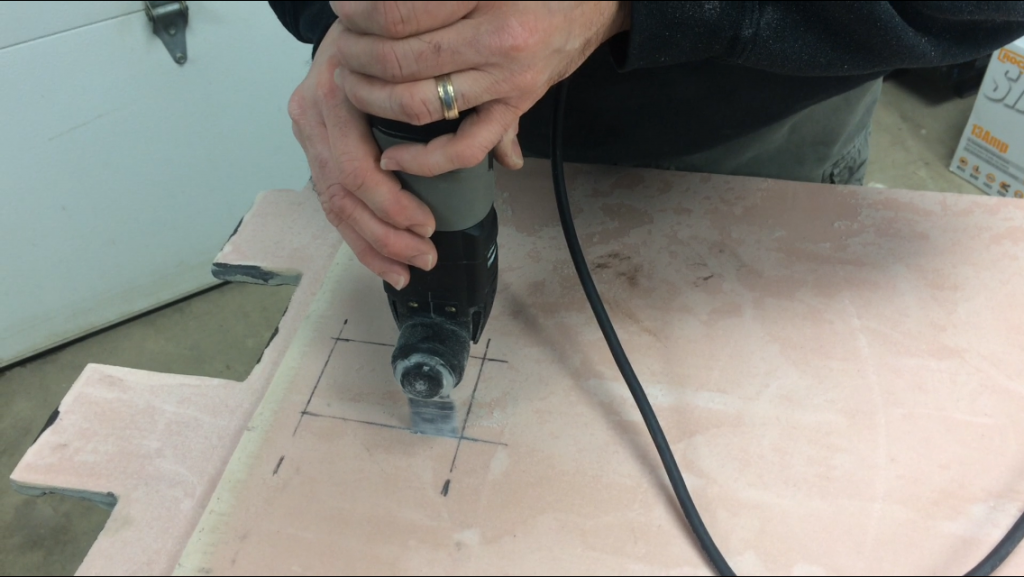 The oscillating cutting tool was perfect for carving outlet holes and cutting the panels to size.