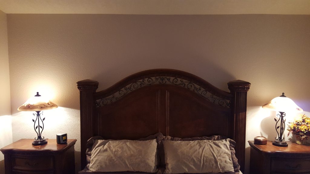The before image of a plain wall in a bedroom