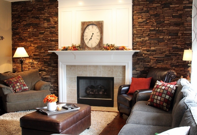 Living room fireplace accent wall created with Norwich Colorado Stacked Stone panels.