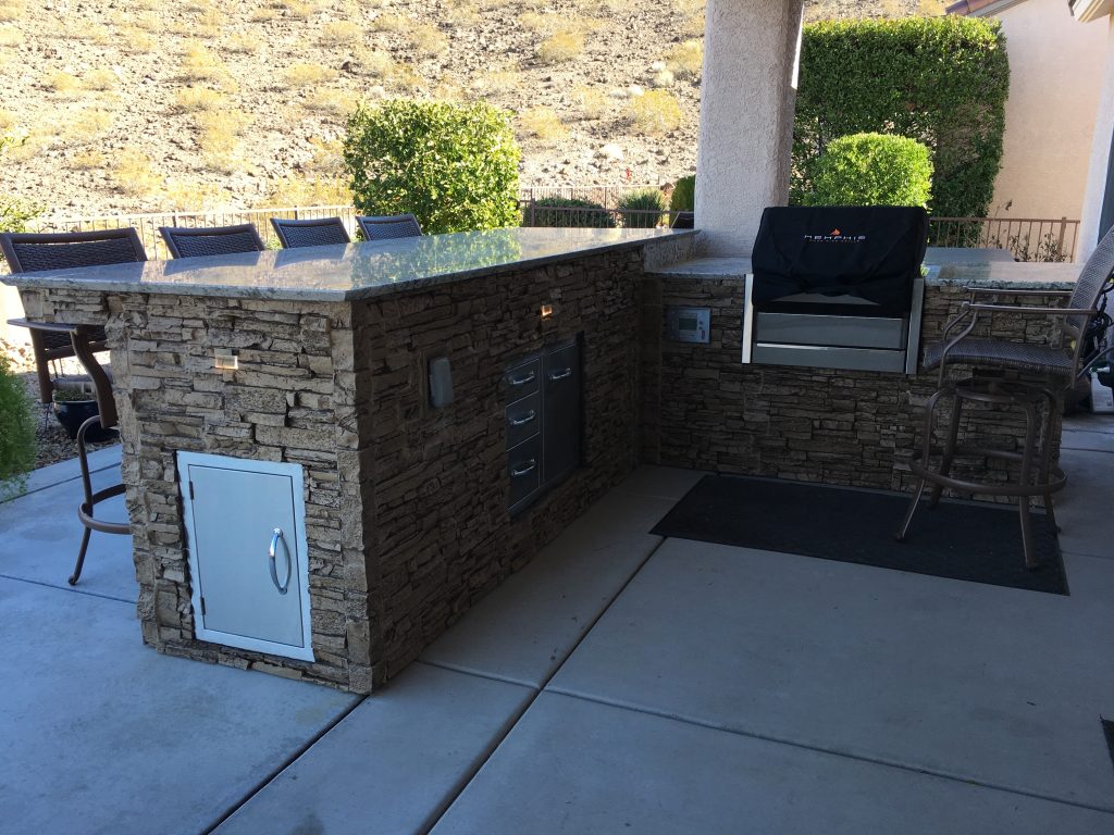 DIY BBQ island finished in Taffy Beige stacked stone panels.