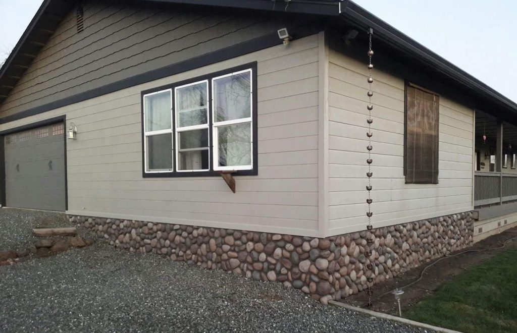 River Rock foundation panels installed on a home's exterior.