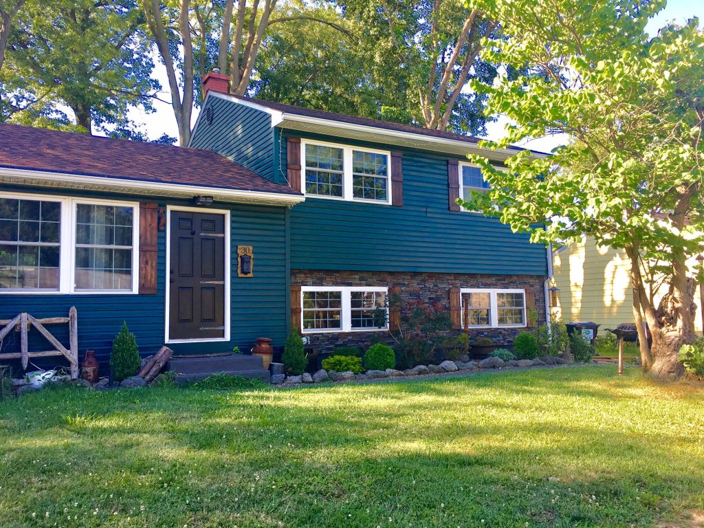 Home exterior after photo, new siding installed.