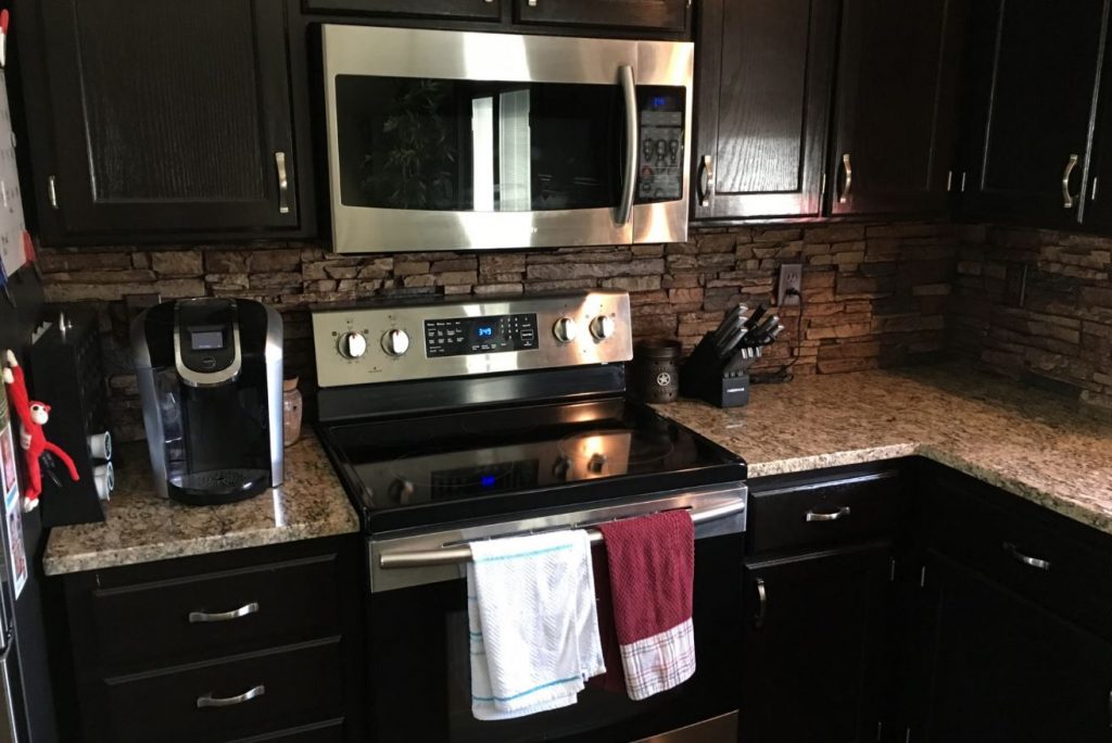 The western wall created a natural border to the installed backsplash.