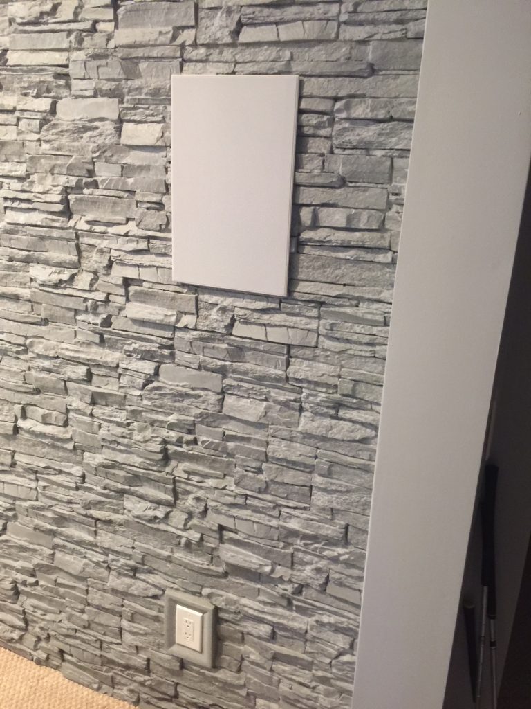  Our accessory outlet cover really helped maintain the faux stone illusion.
