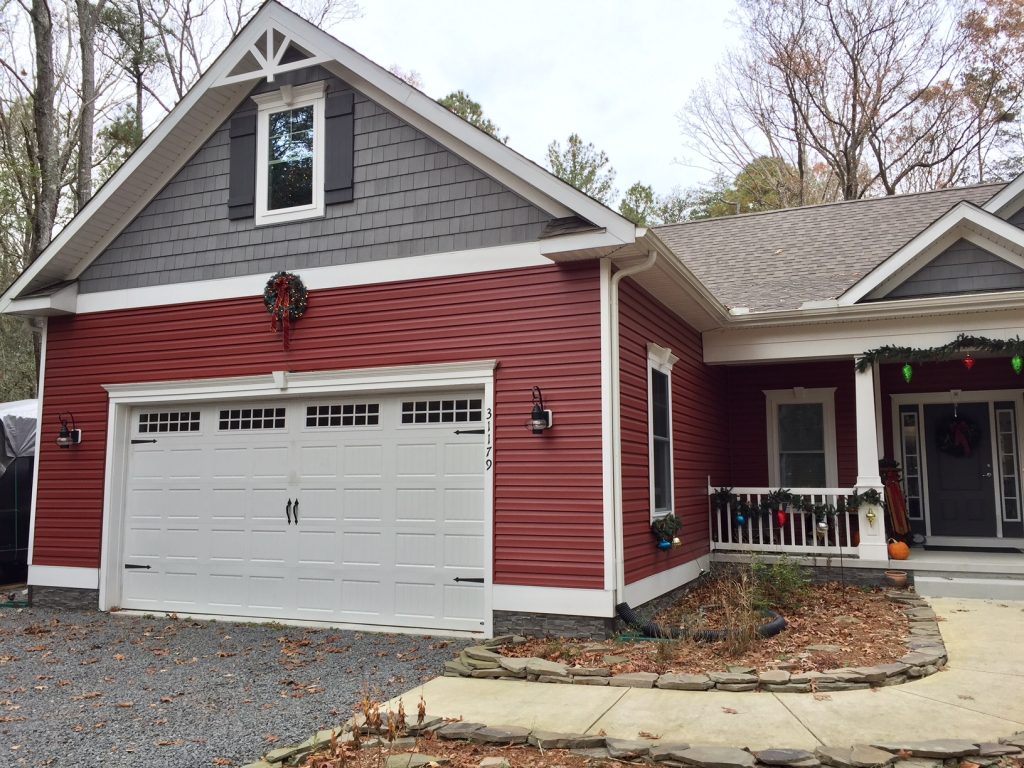 Home foundation resurfaced with Novi siding.