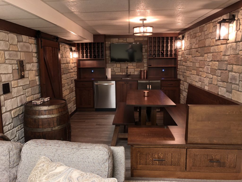 This transformed basement feels like stepping into an underground tavern in Paris, or Bordeaux.