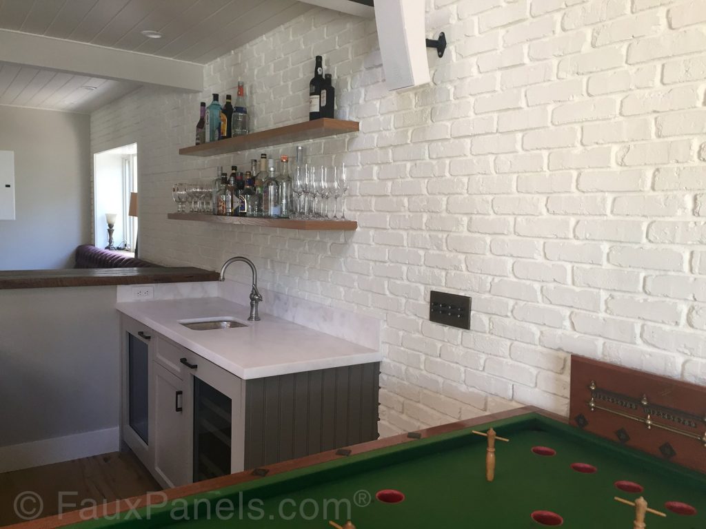 Kitchen wall covered with Glacier White brick veneer panels.