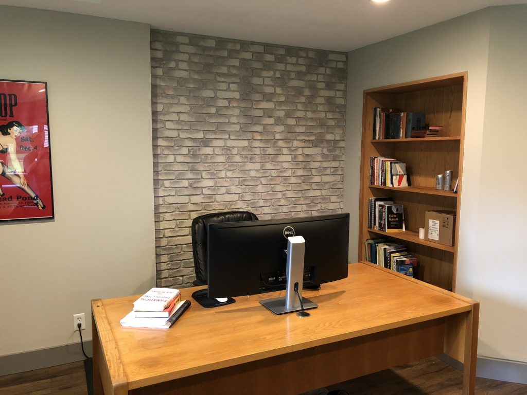 Home office accent wall made with Regency Old Chicago Brick Panels
