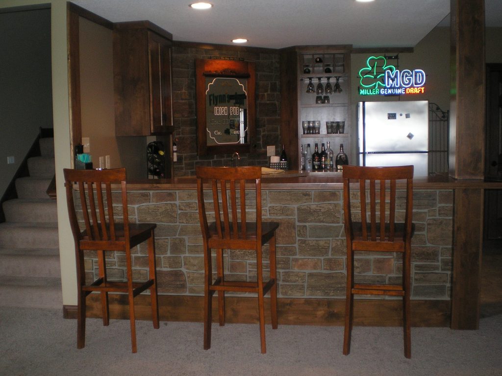 Basement turned Irish pub covered in Carlton Ledgestone panels.