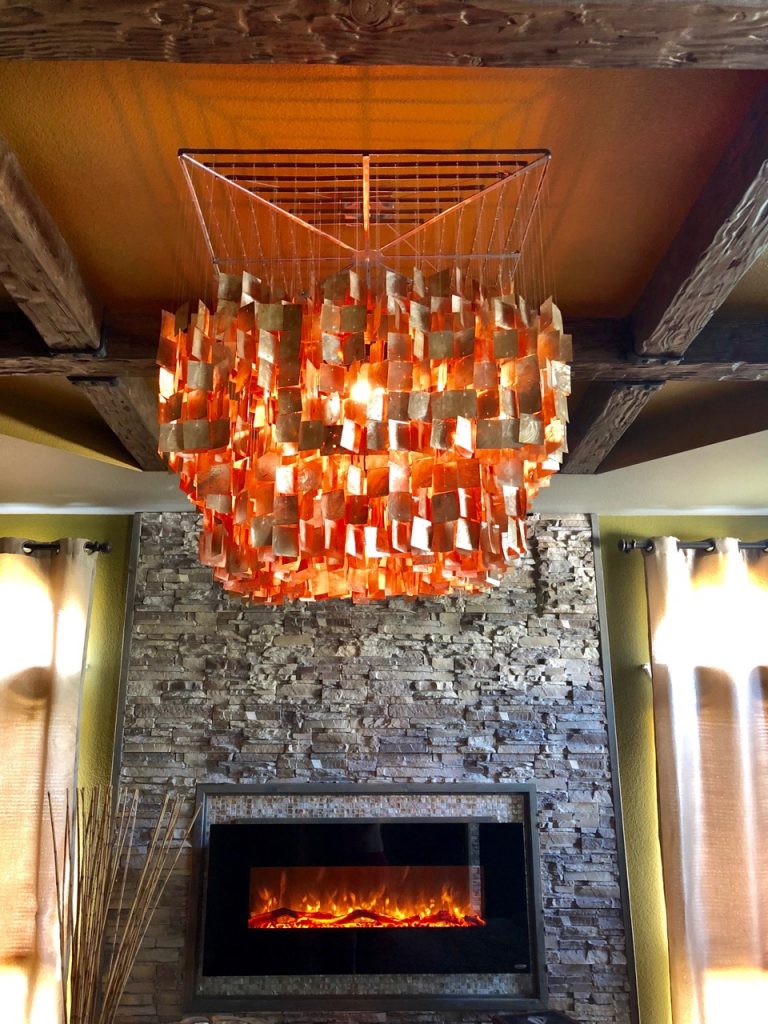 A total home makeover included this new fireplace surround in the master bedroom, created with Norwich Stacked Stone panels in Iced Coffee color.