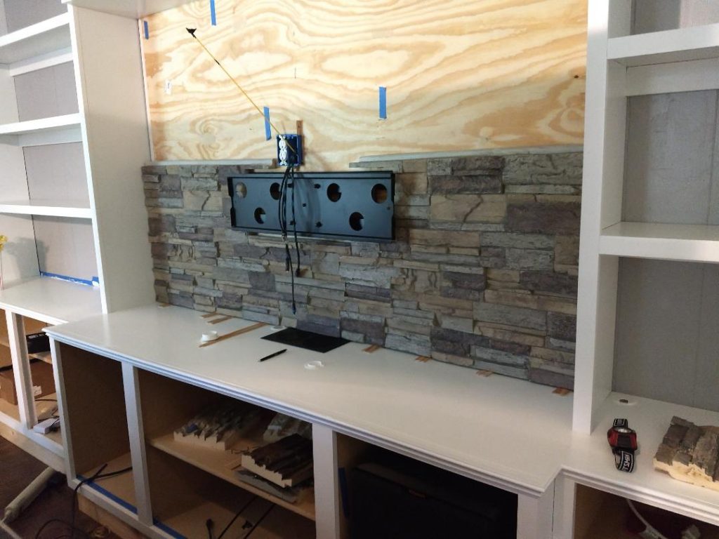 Ron mounted the panels directly to the wood, trimming the panels to fit around the mount and power cables.