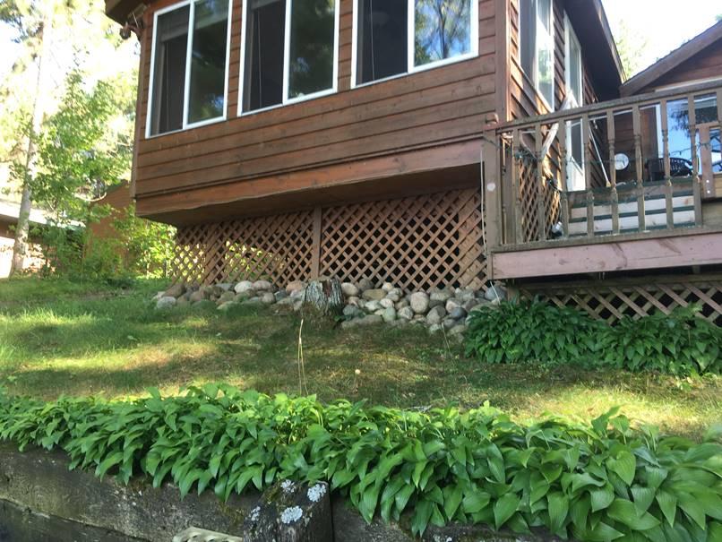 BEFORE: The original lattice didn't suit the style of the home