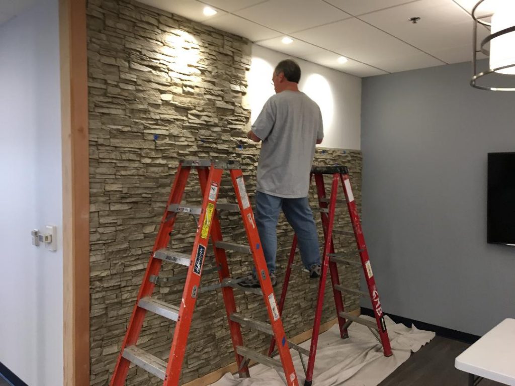 Trimming the wall panels to fit.