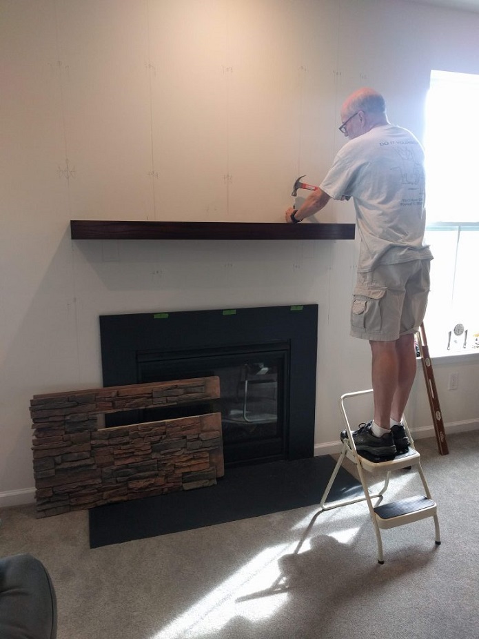 The mantel was installed flush with the wall.