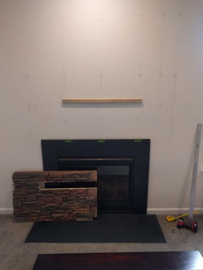 Jack made partial cuts in the panel to make way for the mantel.