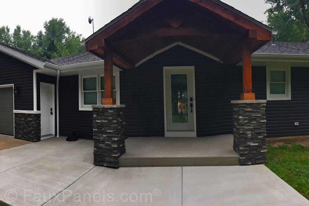 Home's front entrance with faux stone panels and match column wraps.