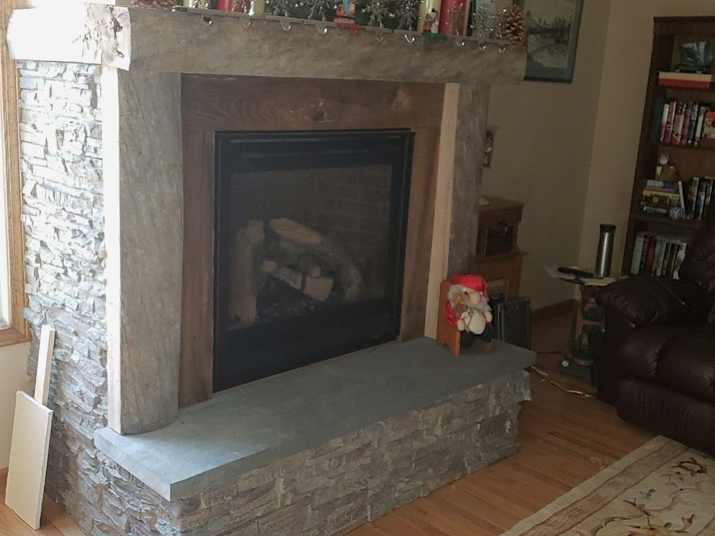 Front room fireplace with Regency Stacked Stone panels in Misty Morning color.