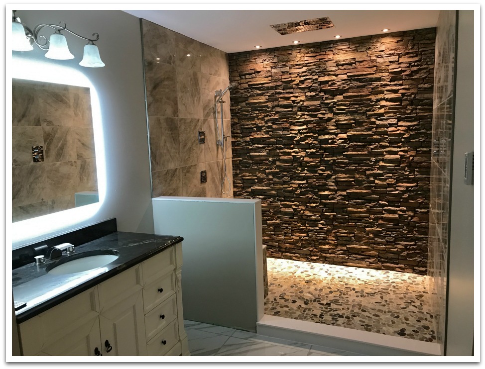 Shower remodeled with Norwich Stacked Stone panels in Earth color.