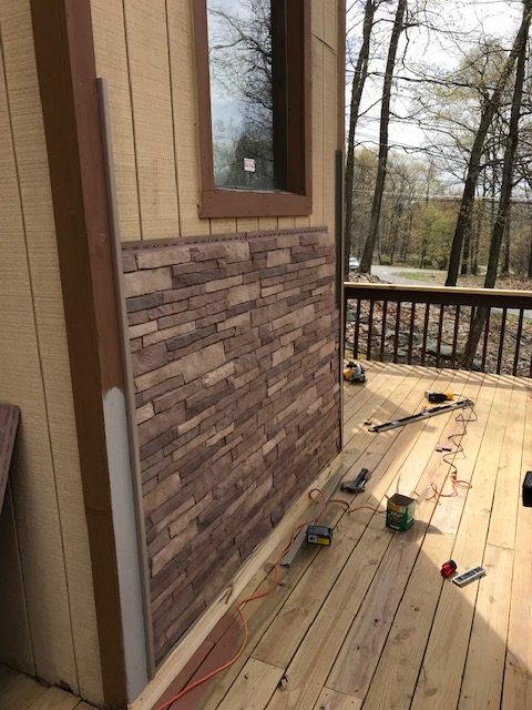 Siding installation with Nailon panels.