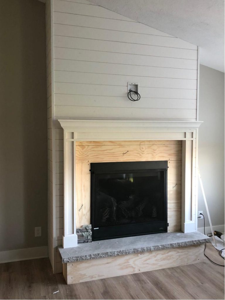 In progress image of fireplace project with the mantel piece added In progress image of fireplace project with the mantel piece added