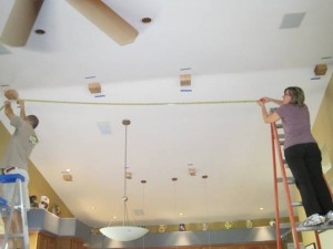 DIY home improvement project, installing fake wood beams