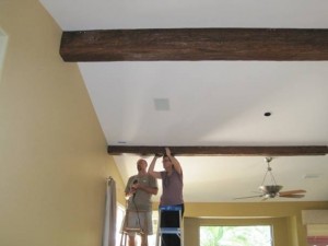 Installing faux timber beams on a kitchen ceiling