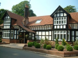 Faux wood planks on a Tudor style home