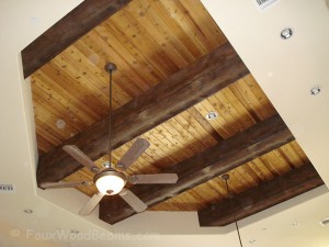 Beams with painted on knots using a darker wood stain.