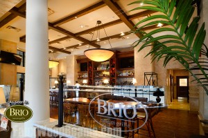 Brio Tuscan Grill in Huntington, NY used faux wood ceiling beams for a classy touch. Add charm to restaurant interior designs with faux ceiling beams like Brio Tuscan Grille.
