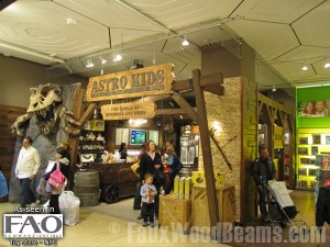 Eye-catching commercial design at FAO Schwarz's Astro Kids. Faux beams frame the entrance into Astro Kids at NYC's FAO Schwarz.